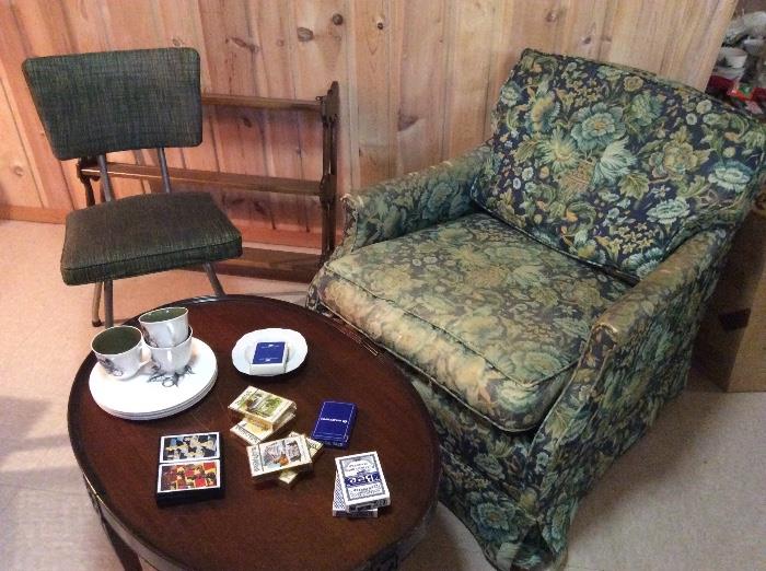 Shabby chic armchair, oval coffee table, MCM vinyl chair