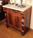 7 - Mahogany empire marble top nightstand, original to Lauri Mundi, 30 in. T, 27 in. W, 16 in. D.
