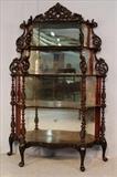 18 - Mahogany pierced carved étagère with twisted columns and mirrors, ca. 1860, 69.5 in. T, 45 in. W, 14 in. D.
