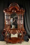 23 - Rosewood rococo étagère with bonnet top, by Thomas Brooks, ca. 1850, 9 ft. 2 in. T.
