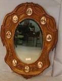 37 - Oval gold gilt French mirror with beveled glass, hand painted portraits on porcelain of Marie Antoinette Court, 41 in. T x 30 in. W.

