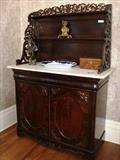 46 - Mahogany rococo parlor étagère with marble top, original finish, pierce carved top supports, ca. 1855, 68 in. T, 50 in. W, 23 in. D.
