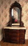 57 - Rosewood rococo dresser, original marble with heavily pierced carved supports, attar, to P. Mallard, ca. 1860, 88 in. T, 48 in. W, 22.5 in. D.
