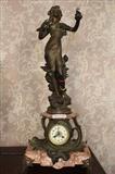 66 - Art Nouveau figural clock of lady with porcelain dial and marble base, marked Aurore Par J. Causse, 33 in. T, 14 in. W, 9 in. D.
