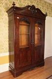 75 - 2 door mahogany rococo bookcase, ca. 1850, 8 ft. 2 in. T, 66 in. W, 22 in. D.
