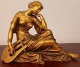 77 - Bronze of lady with harp signed Klay, 10 in. T, 11 in. W, 5 in. D.
