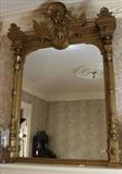 95 - Gold gilt over the mantle mirror with carved shell crown and sides, 7 ft. T, 67 in. W.
