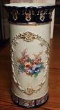 97 - Oversized porcelain umbrella stand with cobalt blue and hand painted flowers, 25 in. T, 12 in. R.

