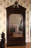 96 - Mahogany 1 door wardrobe with carved crown and sides, 11 ft. T, 50 in. W, 23 in. D.
