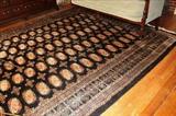 115 - Large navy blue Oriental rug, 9.6 ft. x 12.6 ft.
