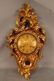 116 - Gold gilded French antique clock windup with pendulum and key, 24 in. L, 14 in. W.
