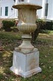 119 - Matched pair solid cast iron outdoor yard urns on iron base, 5 ft. 11 in. T. x 32 in. W.
