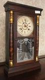 127 - Empire style calendar clock by Columbus Clock Co., Columbus MS, 25 in. T, 15 in. W.
