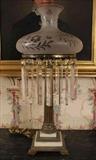 132 - Antique sinumbra lamp with double step base and 7 in. Prisms, 24 in. T, 12 in. W.
