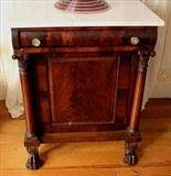 147 - Period mahogany Empire side cabinet with claw feet and white marble. 26 in. W, 20 in. D, 34 in. T.
