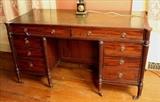 150 - Sheraton style leather top desk, ca. 1840, 30 in. T, 26 in. D, 55 in. W.
