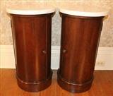 156 -Matched pair mahogany Empire Somnoes with white marble tops, 20 in. T, 16 in. R.
 