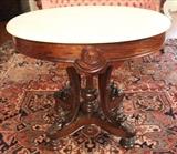153 - Rosewood Victorian oval marble top table with good original finish and marble, 34 in. L, 26 in. W, 30 in. T.

