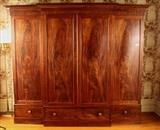 162 - Mahogany 4 door linen press with 3 drawers, 86 in. T, 97 in. W, 23 in. D.
