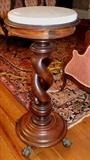179 - Oversized mahogany twisted column pedestal with white marble and brass figural feet, 41 in. T, 15 in. D.
