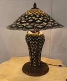 197 - Leaded glass Tiffany style lamp with mushroom shade, 33 in. T, 26  in. W.
