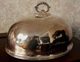 203 - Large silver-plate dome signed Nappin Bros. London.
