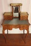 250 - Marquetry inlaid rosewood Bonheur du  jour table with gilt galleries, beveled mirror and marble top, 48 in. T, 29 in. W, 21 in. D.
