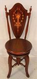 261 - Mahogany inlay piano chair with back, 38 in. T, 15 in. W, 18 in. D.
