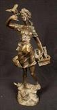 296 - Bronze statue of girl with bird, signed L Gilemun, 16.5 in. T, 11 in. W.
