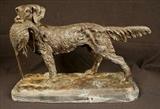 297 - Bronze bird dog on marble base with bird in mouth, 12 in. T, 16.5 in. W.
