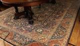 318 - Antique Persian rug, blue and mauve, showing some wear, 12 ft. 7 in. x 9 ft. 9 in.
