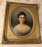 328 - Oil on canvas of Victorian lady in oval ornate frame, 38 x 32
