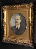344 - Photograph and charcoal of gentlemen with mustache in gold shadow box frame, 32 x 28.
