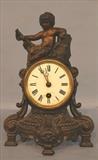 357 - Bronze cupid clock, 11 in. T, 7.5 in. W.
