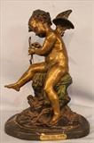 358 - Bronze of sitting cupid with bow, 20 in. T, 13 in. W.
