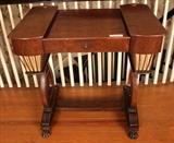 365 - Empire mahogany work table with paw feet, 30 in. T, 31 in. W, 19 in. D.
