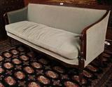 395 - Mahogany Sheraton sofa with 6 legs and green upholstery, 76 in. W, 23 in. D, 37 in. T.
