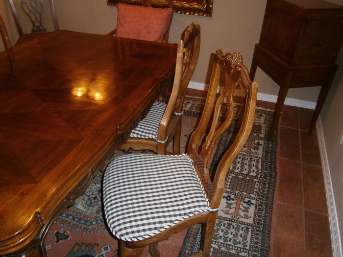 hand carved walnut dining chairs with charming check cushions 