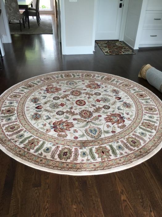 8' round Karastan rug and pad