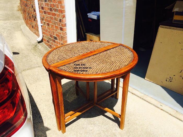 Round part wicker table in 2 sections.  Can be used separately  $50