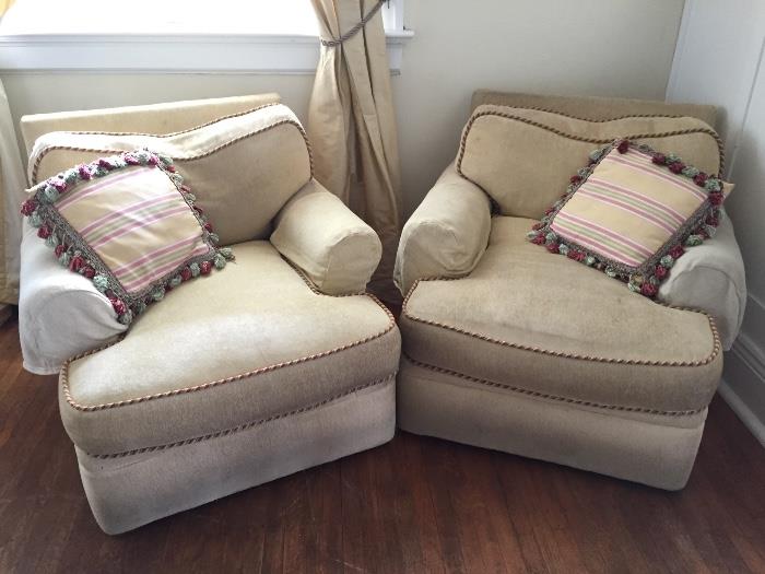 Pair upholstered club chairs. I thin they're down.