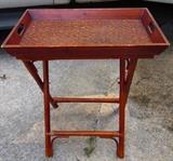 Wicker serving tray on folding stand