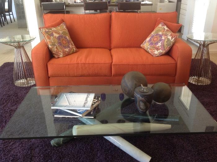 Modern design sofa,  radial side table, and purple area rug.  (Sorry the coffee table is not for sale, it was bequeathed to family)