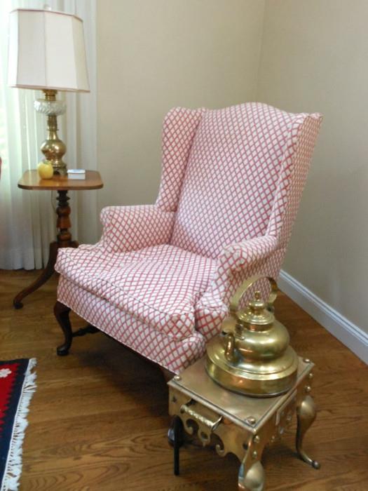 Wing chair, antique stand and brass kettle on stand