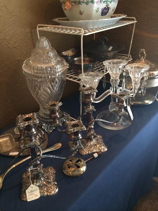 Silver plate candelabras and other serving pieces