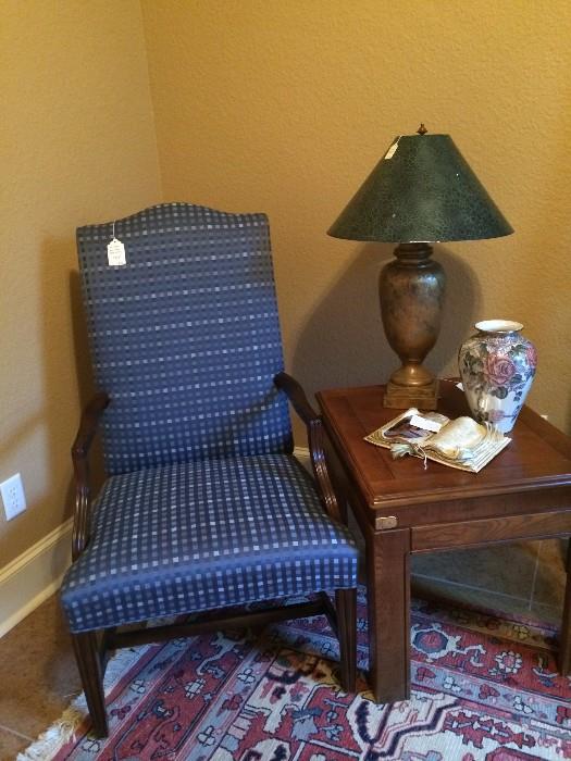 Blue armed chair; rectangular side table