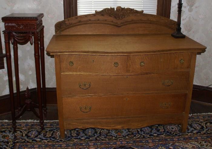 Carved oak serpentine 4 drawer dresser. 43.5 H x 24 x 50 $495.00