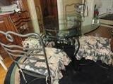 GLASS TOP WROUGHT IRON KITCHEN TABLE AND CHAIRS WITH CUSTON CUSHIONS
