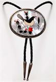 Lot 21: Zuni sterling Cactus Wren bolo tie, hand inlaid with 
17 jet, ivory and coral pieces on mother of pearl, the bolo
measuring 2.7" x 2.2", retailed at $695.00 est. $150.00-$200.00