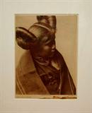 Lot 64: Curtis Edwards (186801952) photogravure entitled "Chaiwa-Tewa-
Profile" issued 1921, produced by Suffolk Eng. Co., Boston 1921, plate
415, some water damage to lower right margin, gallery priced at 
$3,500.00 est. $700.00-$1,000.00